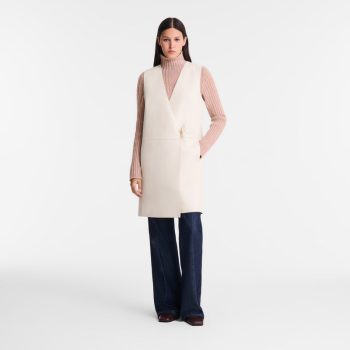 Sleeveless jacket                                                                                                    Ecru - Leather